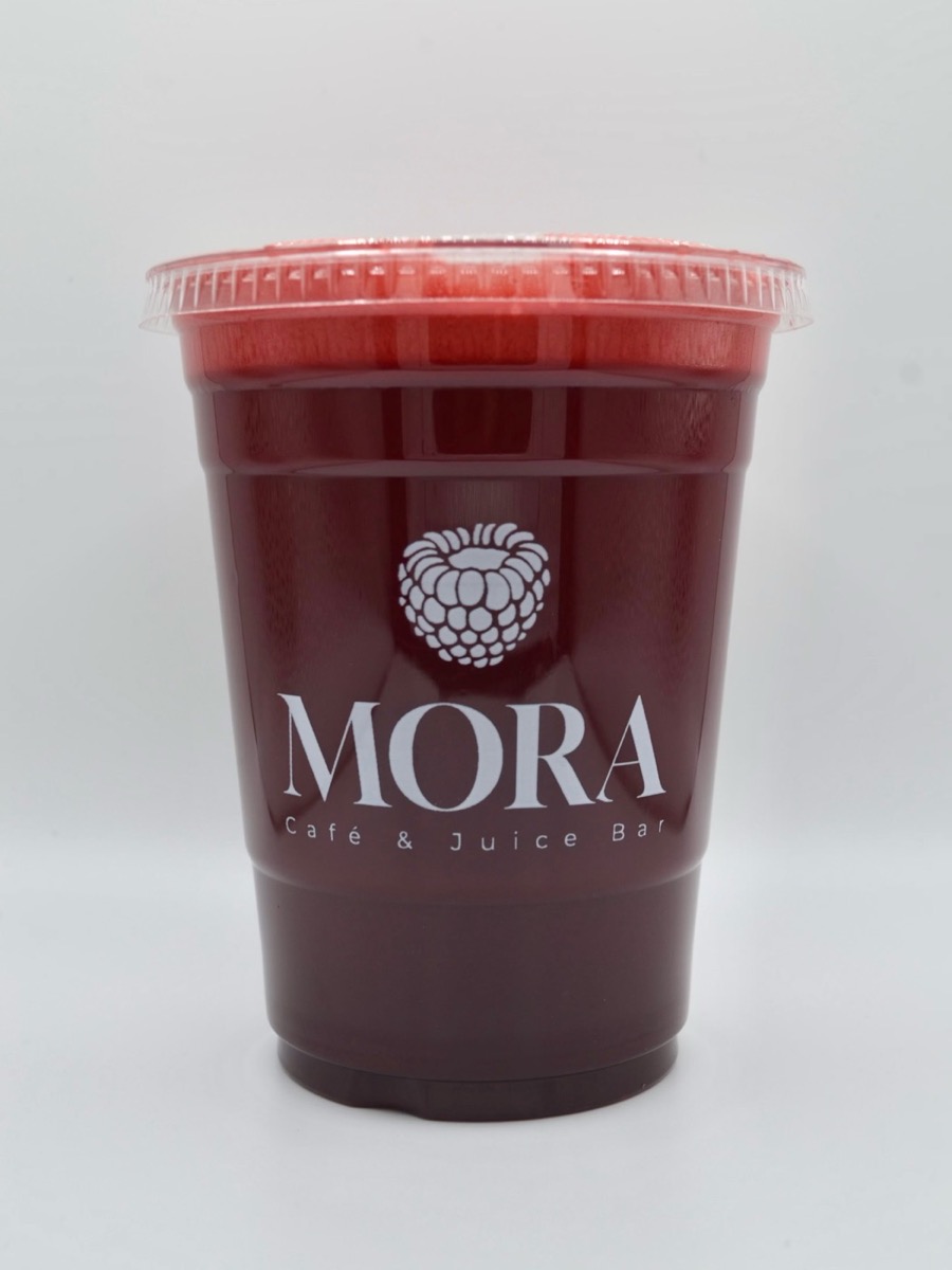 Cold-pressed green juice in a Mora cup